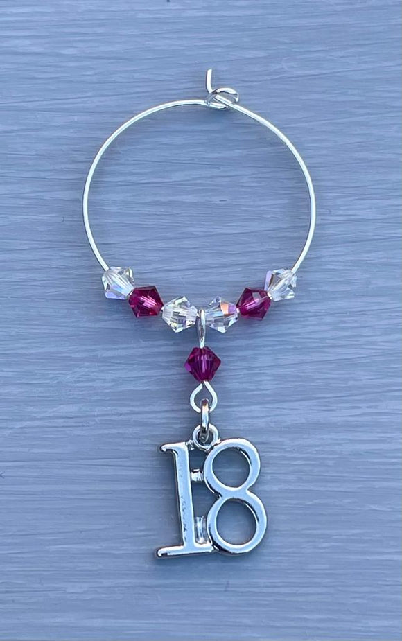 18th Birthday Wine glass charm. Perfect gift for someone celebrating their 18th Birthday, add a bottle of wine to add that extra touch!   1 charm set on a silver plated ring, with crystals.   Item will be sent in an organza bag.   Crystal colours can be changed – see colour chart and choose with the drop down menu  Birthstone colours available.  Please contact me if you require different coloured crystals.