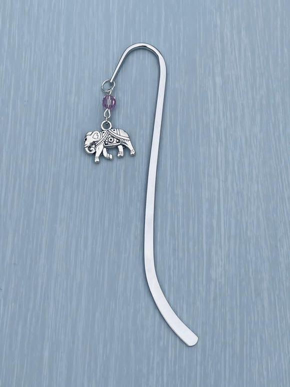 Set on a Silver Plated shaped Bookmark is a Specialist Crystals and a Silver plated Elephant.   I have used a Light purple Specialist Crystal but there are up to 72 colours to choose from - please let me know when ordering  This would make a lovely gift for Mother's Day, Birthday or Christmas     **15% of total cost is donated to WWF**