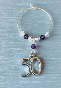 Handmade with Amethyst Austrian Crystals and finished with a silver plated 50 charm - Amethyst is the birthstone colour for February - This wine glass charm is a lovely gift for her