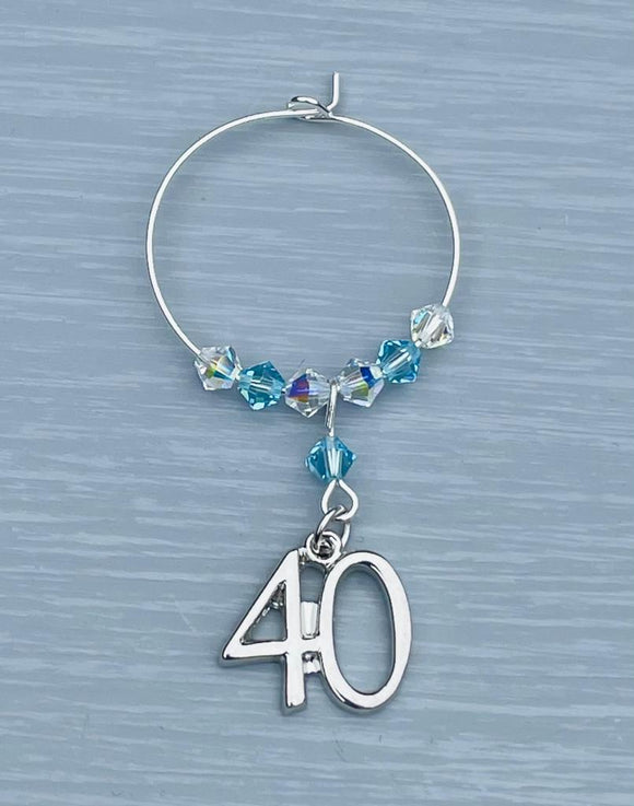 Handmade with Blue Zircon specialist Crystals and finished with a silver plated 40 charm make this gorgeous 40th Wine Glass Charm a great gift for her - Blue Zircon is the birthstone colour for December