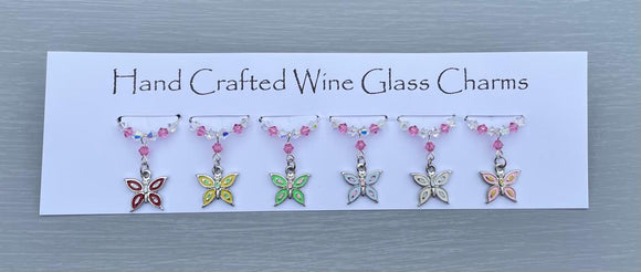 Butterfly themed Wine glass charms. Perfect gift for butterfly lovers or for yourself!  6 charms set on silver plated rings, with Austrian crystals.  Item will be sent in an organza bag.  Crystal colours can be changed – see next picture.   Please contact me if you require different coloured crystals.