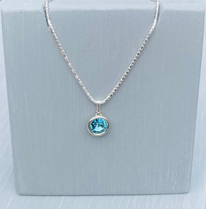 Set in a Sterling Silver Setting is an aquamarine Swarovski Crystal and finished with an 18inch 925 Sterling Silver Popcorn  Chain - Aquamarine is the birthstone for March - March birthday gift for Her - Mother's Day Gifts - Crystal is the chosen gift for 15th Wedding Anniversary Gifts