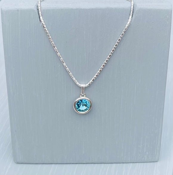 Set in a Sterling Silver Setting is an aquamarine Swarovski Crystal and finished with an 18inch 925 Sterling Silver Popcorn  Chain - Aquamarine is the birthstone for March - March birthday gift for Her - Mother's Day Gifts - Crystal is the chosen gift for 15th Wedding Anniversary Gifts