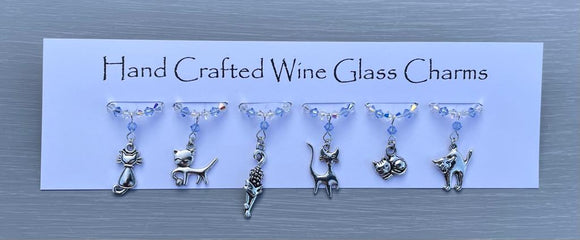 Cat themed Wine Glass Charms.  Perfect gift for Cat lovers or for yourself!  6 charms set on silver plated rings, with Austrian crystals.   Item will be sent in an organza bag.  Crystal colours can be changed - see next picture.  Please contact me if you require different coloured crystals.