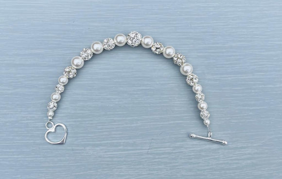 Handmande with crystal pearls and Diamate rounds, finished with 925 sterling silver heart toggle clasp