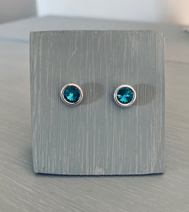 These stunning stud earrings are handmade with 925 Sterling Silver & Austrian crystals.  Blue Zircon is the colour although many colours also available, these make perfect gifts for birthdays, anniversary's and wedding accessories.  Blue Zircon is the birthstone colour for December and also makes a gorgeous Mother's Day Gift  Crystals are the chosen gifts for 15 year wedding anniversary.  Matching necklaces and cufflinks make great bridesmaids/Best man gifts/accessories to match our wedding theme.